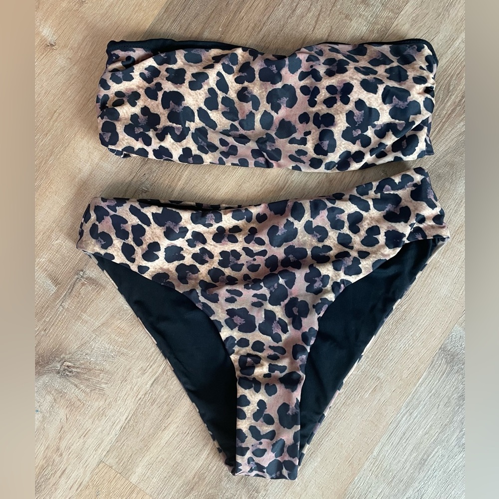 Pink Lily swimsuit. Never worn. Size M top. Size L bottoms